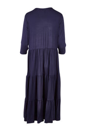 Product shot of the Belle Tiered Jersey Maxi Dress in colour Navy (Blue), from the back