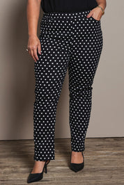 Model Ashleigh wearing size 16 of the Belle Printed Pull On Slim Leg Cotton Stretch  Pant in colour Blackwhite (Black), from the front, cropped image