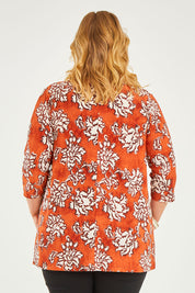 Model Caitlin wearing size 20 of the Belle High Low Tee Shirt in colour Rustfloral, from the back