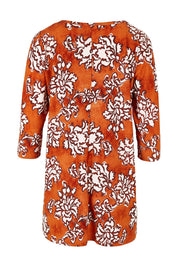 Product shot of the Belle High Low Tee Shirt in colour Rustfloral, from the back