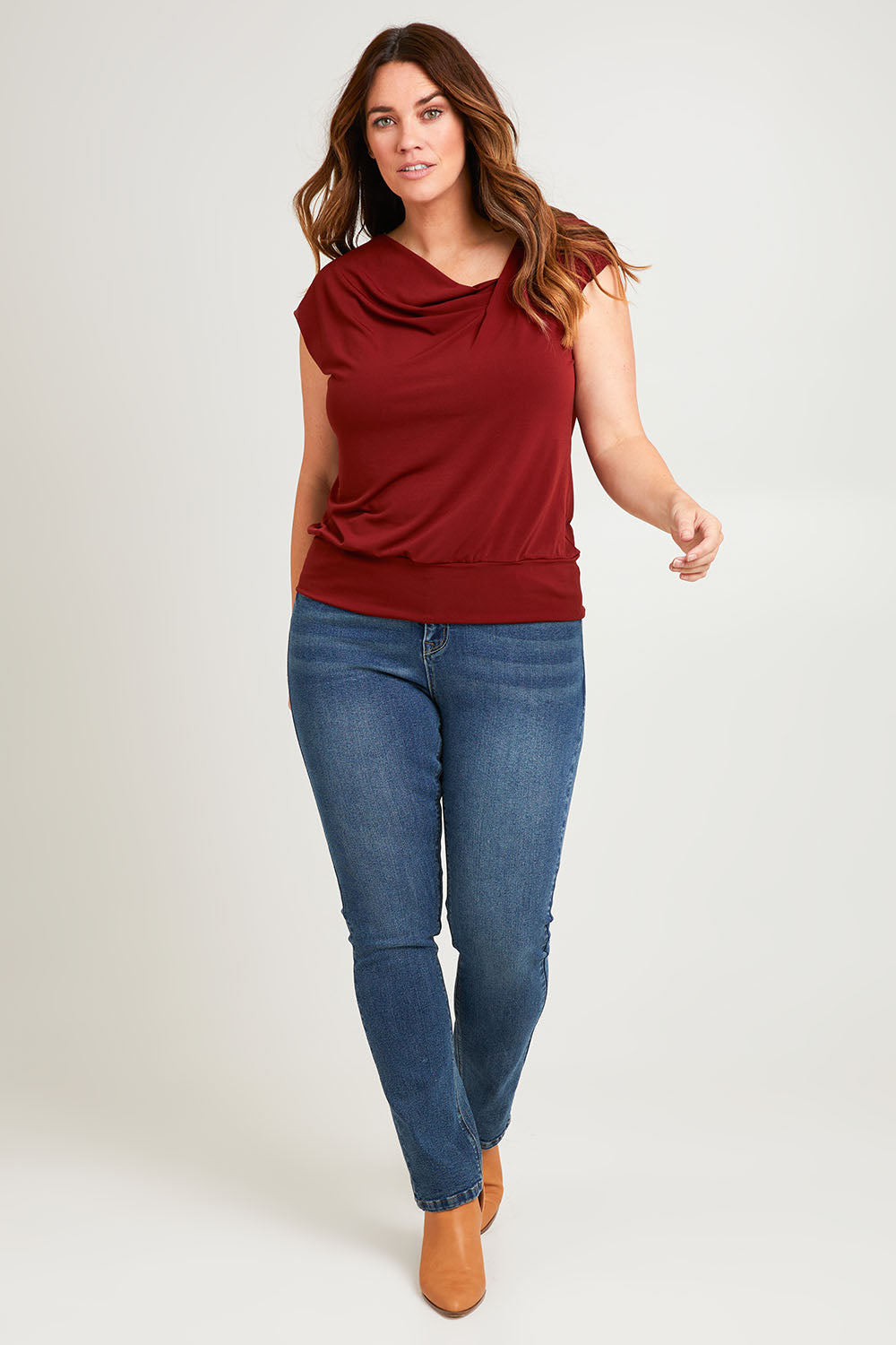Model Laura wearing size 14 of the Belle Boot Leg Jean in colour Denim (Blue), from the front, showing the whole outfit