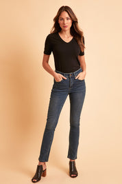 Model Madeline wearing size 10 of the Belle Boot Leg Jean in colour Denim (Blue), from the front, showing the whole outfit