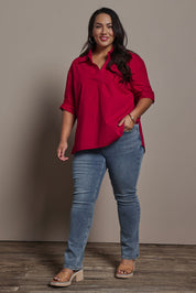 Model Ashleigh wearing size 16 of the Belle Boot Leg Jean in colour Mediumblue (Blue), from the front, showing the whole outfit