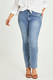 Model Terri-Leigh wearing size 14 of the Belle Boot Leg Jean in colour Mediumblue (Blue), from the front, cropped image