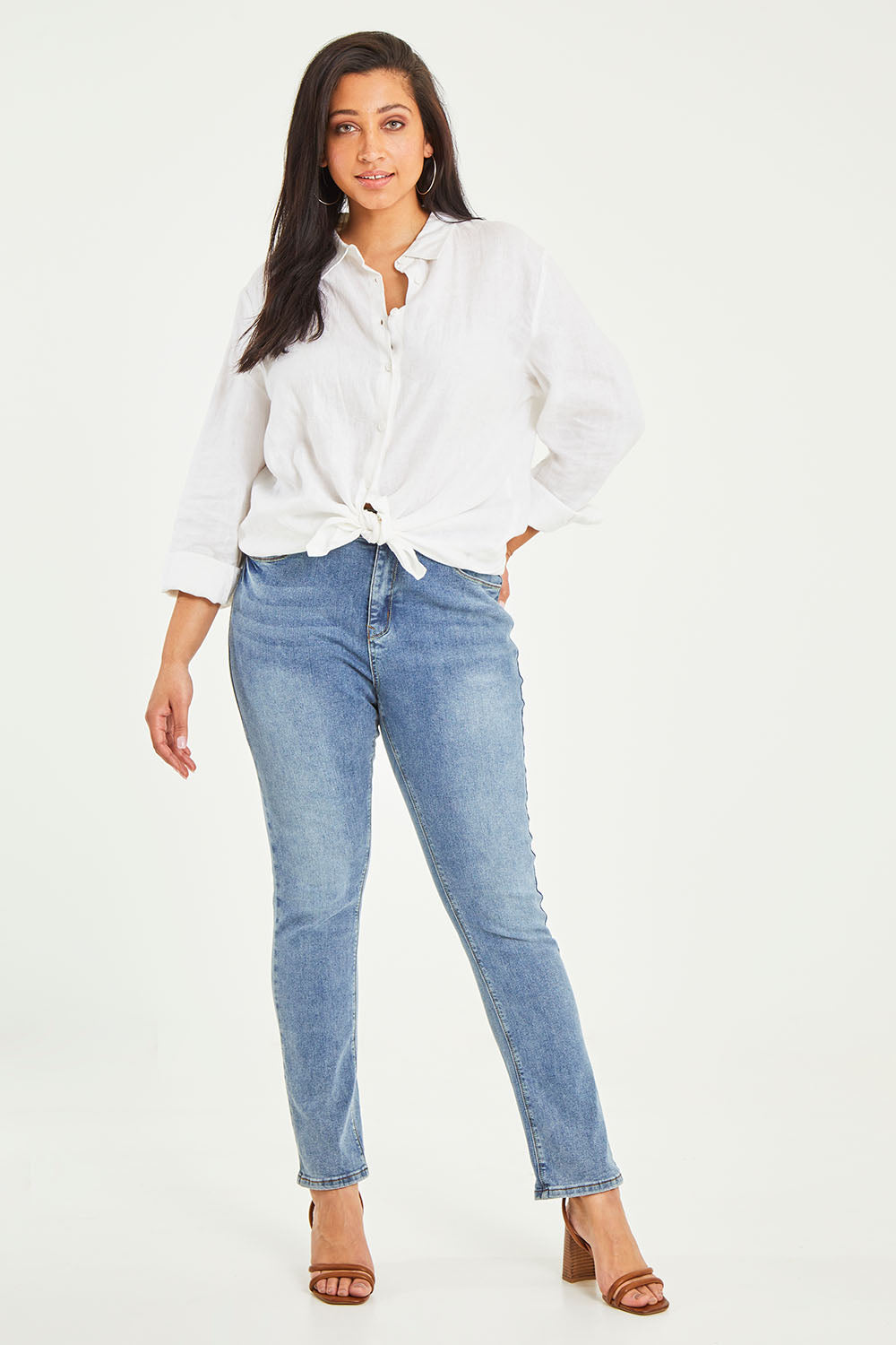 Model Terri-Leigh wearing size 14 of the Belle Boot Leg Jean in colour Mediumblue (Blue), from the front, showing the whole outfit
