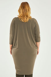 Model Caitlin wearing size 20 of the Belle High Low Easy Wear Dress in colour Khaki (Green), from the back