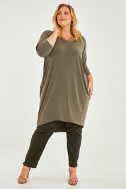 Model Caitlin wearing size 20 of the Belle High Low Easy Wear Dress in colour Khaki (Green), from the front, showing the whole outfit