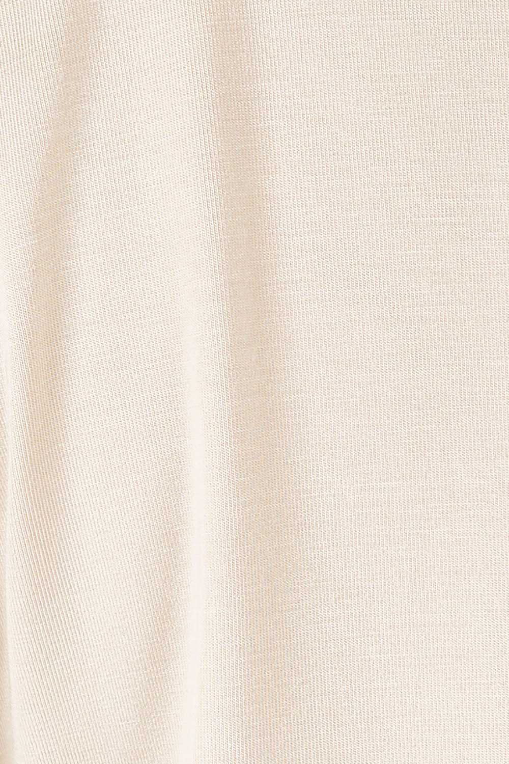 Product shot of the Belle Asymmetric Luxe Bamboo Tank in colour Straw, detail