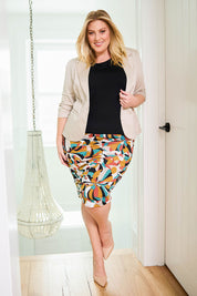 Model Caitlin wearing size 18 of the Belle Lined Side Gathered Skirt in colour Multiprint, from the front, showing the whole outfit