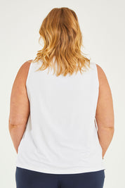 Model Caitlin wearing size 20 of the Belle Luxe Bamboo Tank in colour White (White), from the back