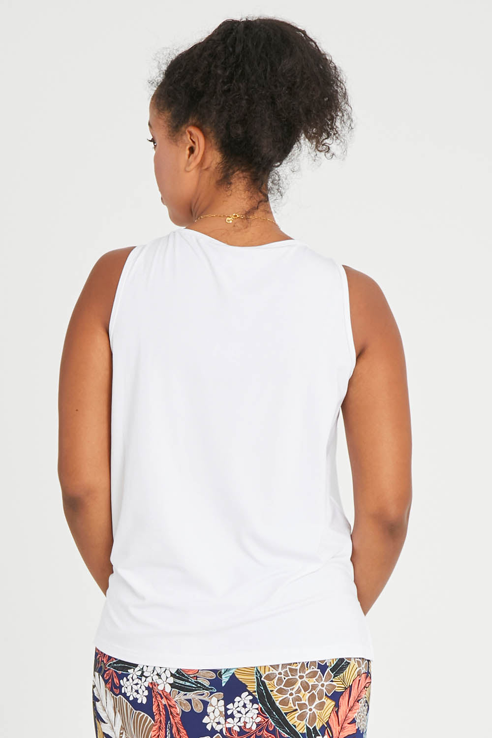 Model Noli wearing size 14 of the Belle Luxe Bamboo Tank in colour White (White), from the back
