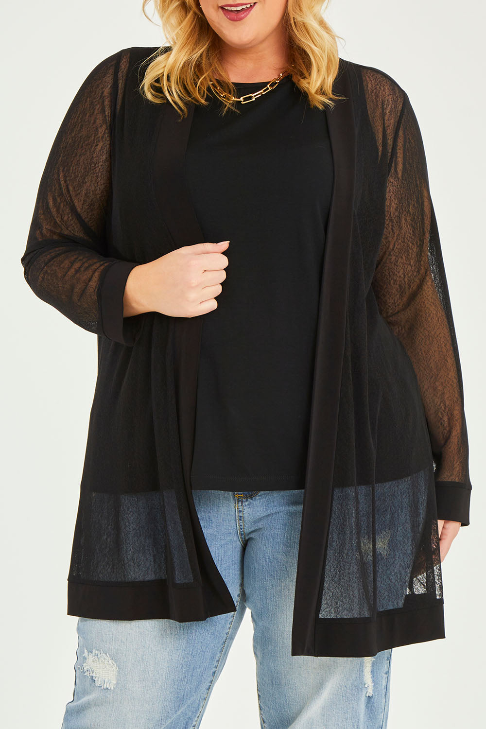 Model Caitlin wearing size 20 of the Belle Long Mesh Cardigan in colour Black (Black), from the front, cropped image