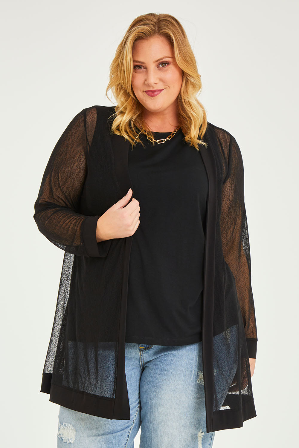 Model Caitlin wearing size 20 of the Belle Long Mesh Cardigan in colour Black (Black), from the front, cropped image