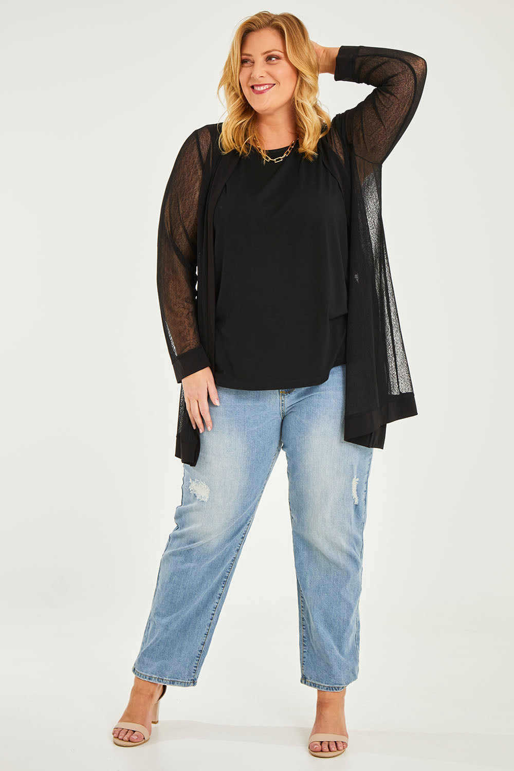 Model Caitlin wearing size 20 of the Belle Long Mesh Cardigan in colour Black (Black), from the front, showing the whole outfit