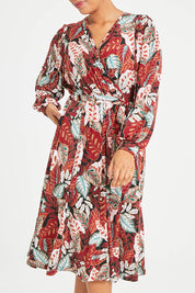 Model Noli wearing size 14 of the Belle Full Sleeve Print Dress in colour Floral (Red), from the front, cropped image