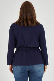 Model Monique wearing size 14 of the Belle X Over Long Sleeve Tee in colour Navy (Blue), from the back