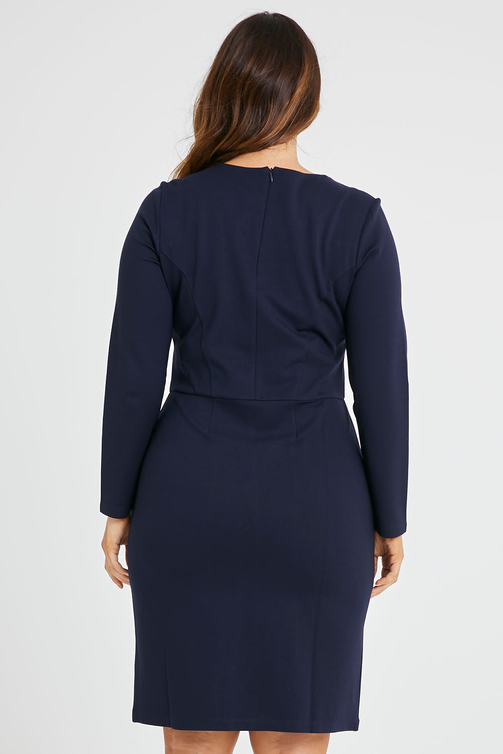 Model Laura wearing size 14 of the Belle Panelled Ponte Dress in colour Darknavy (Blue), from the back
