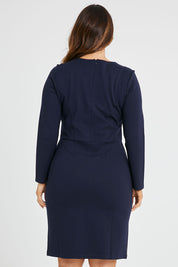 Model Laura wearing size 14 of the Belle Panelled Ponte Dress in colour Darknavy (Blue), from the back