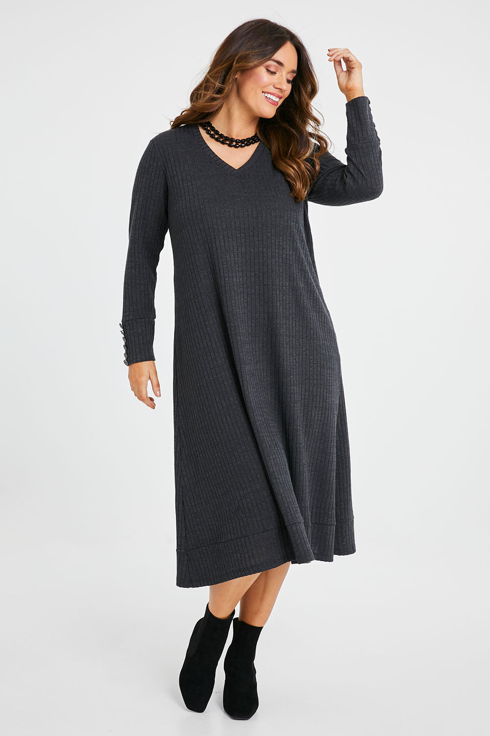 Model Laura wearing size 14 of the Belle Fit & Flare Lined Knit Dress in colour Steelgrey (Grey), from the front, showing the whole outfit