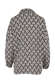 Product shot of the Belle Batwing Printed Shirt in colour Blackivory (Black), from the back