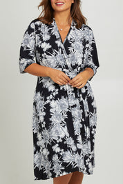 Model Monique wearing size 14 of the Belle Classic Full Skirt Dress in colour Blackgrey (Black), from the front, cropped image