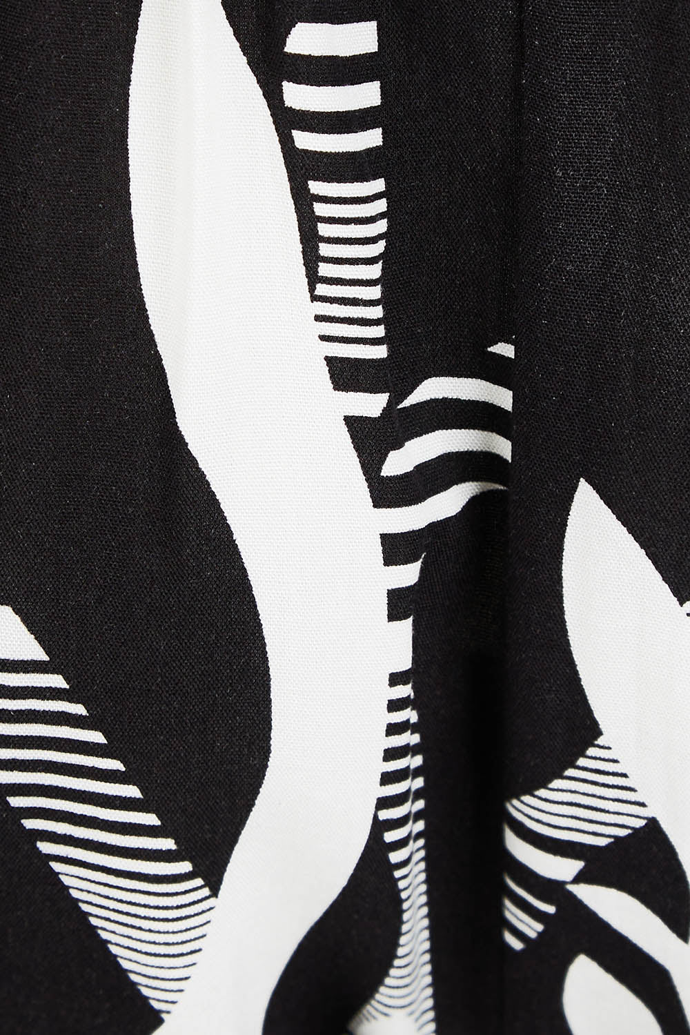 Product shot of the Belle Relaxed Wide Leg Pull On Pant in colour Blackivory (Black), detail