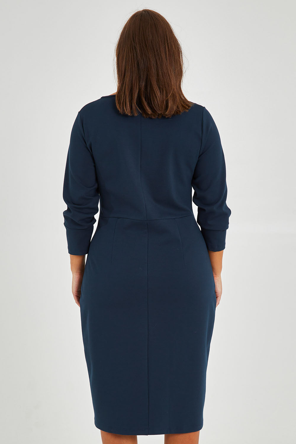 Model Monique wearing size 14 of the Belle Keyhole Ponte Dress in colour Lagoon (Blue), from the back