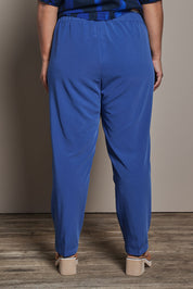 Model Ashleigh wearing size 16 of the Belle Pull On Tailored Soft Suiting  Pant in colour Ink (Blue), from the back