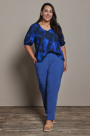 Model Ashleigh wearing size 16 of the Belle Pull On Tailored Soft Suiting  Pant in colour Ink (Blue), from the front, showing the whole outfit