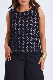 Model Monique wearing size 14 of the Belle Lined Embroided Tank in colour Black (Black), from the front, cropped image
