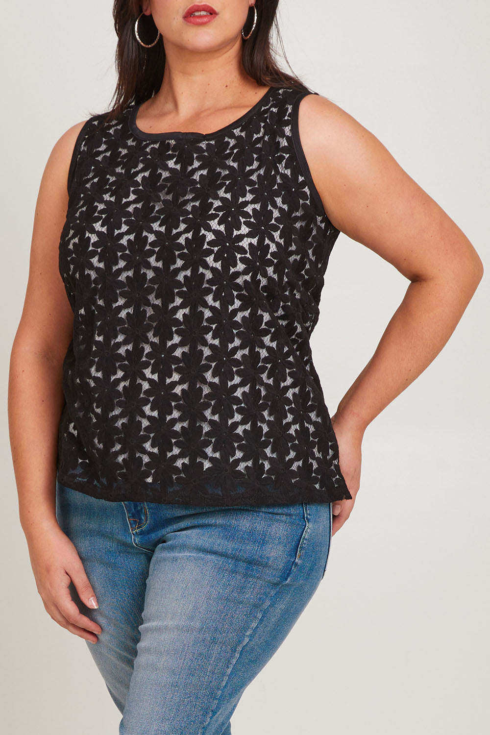 Model Poppy wearing size 16 of the Belle Lined Embroided Tank in colour Black (Black), from the front, cropped image