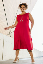 Model Alexis wearing size 18 of the Belle Summer Fit & Flare Dress in colour Red (Red), from the front, showing the whole outfit