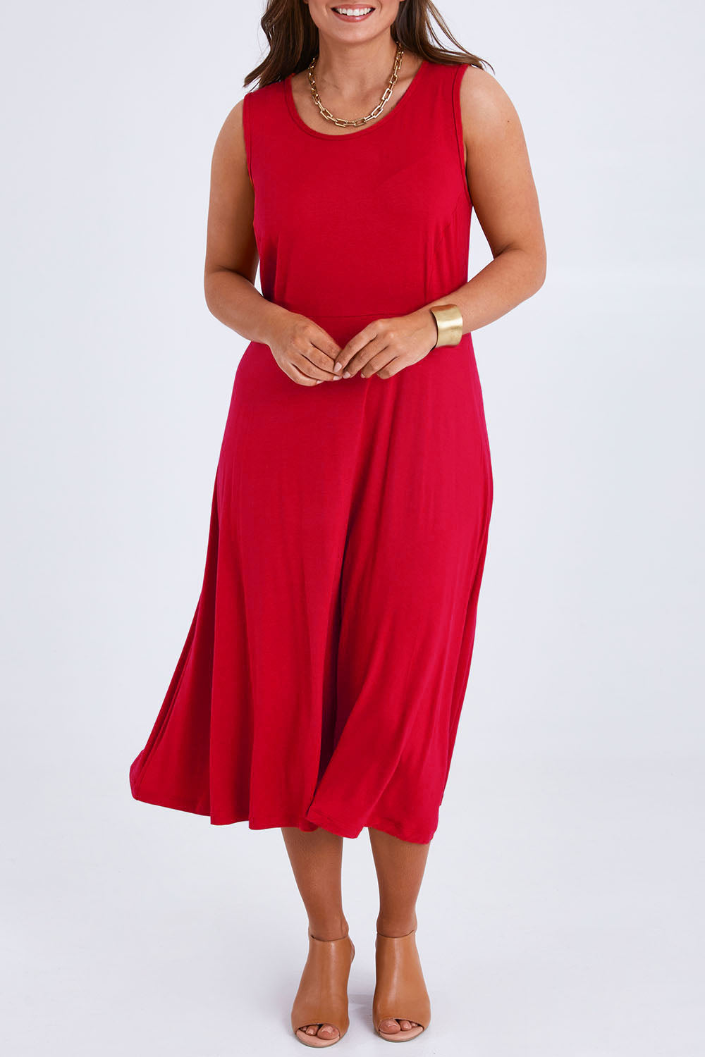 Model Monique wearing size 14 of the Belle Summer Fit & Flare Dress in colour Red (Red), from the front, cropped image