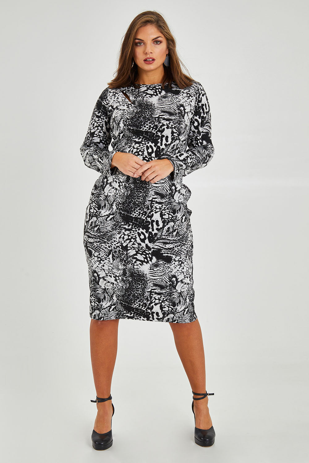 Model Monique wearing size 14 of the Belle Jacquard Knit Dress in colour Greyblack (Grey), from the front, showing the whole outfit