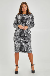 Model Monique wearing size 14 of the Belle Jacquard Knit Dress in colour Greyblack (Grey), from the front, showing the whole outfit