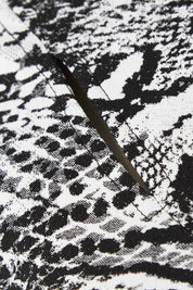 Product shot of the Belle Jacquard Knit Dress in colour Greyblack (Grey), detail