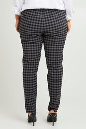 Model Monique wearing size 14 of the Belle Check Pull on Pant in colour Blackwhite (Black), from the back