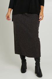 Model Monique wearing size 14 of the Belle Pull On Rib Maxi Skirt in colour Mocha, from the front, cropped image