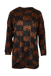 Product shot of the Belle Soft Knit Printed Top in colour Navytan (Blue), from the front