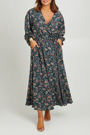 Model Monique wearing size 14 of the Belle X Over Maxi Dress in colour Fluergreen (Green), from the front, cropped image