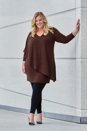 Model Caitlin wearing size 18 of the Belle V Neck Overlay Knit Dress in colour Chocolate, from the front, showing the whole outfit