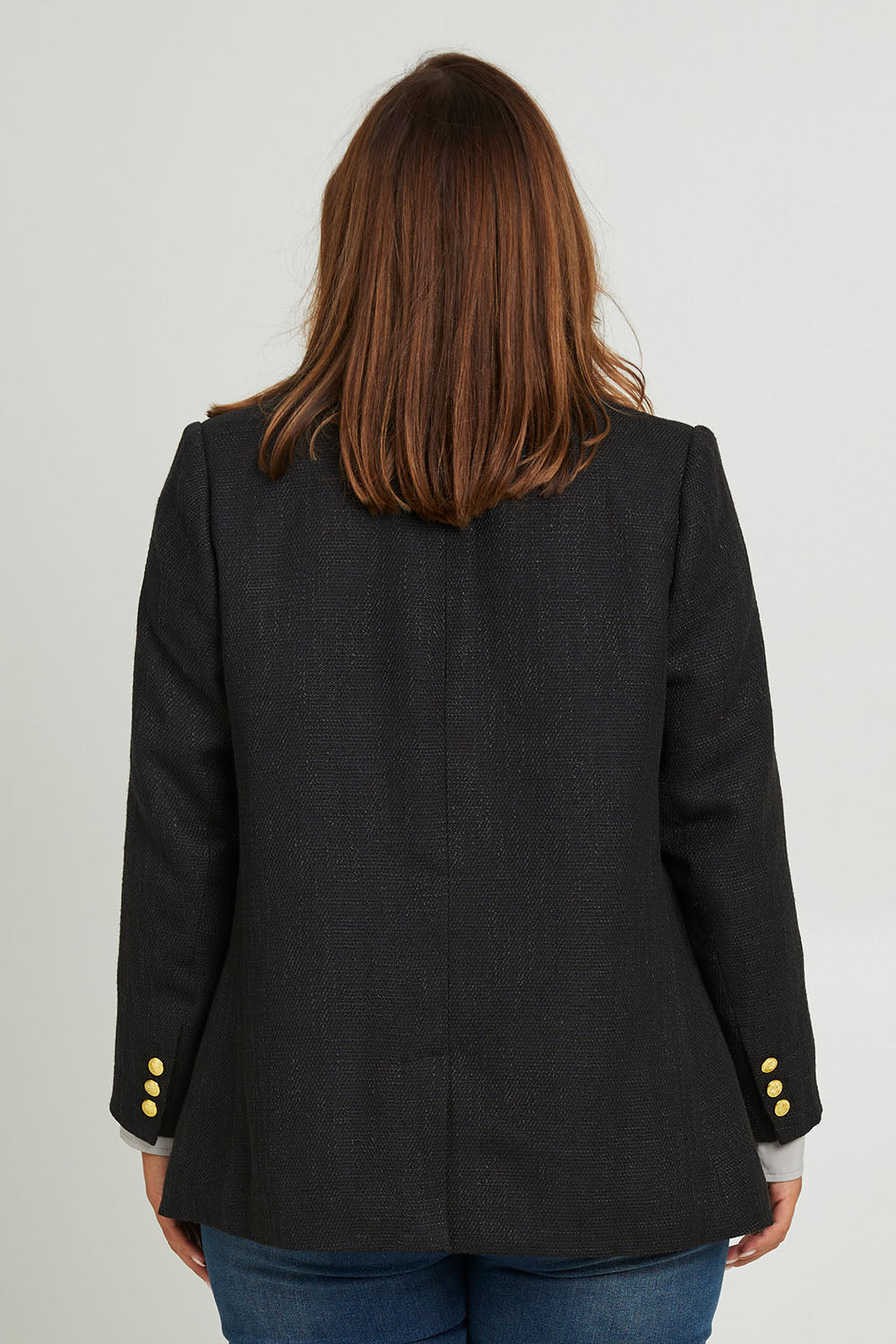 Model Monique wearing size 14 of the Belle Boucle Double Breasted Jacket in colour Black (Black), from the back