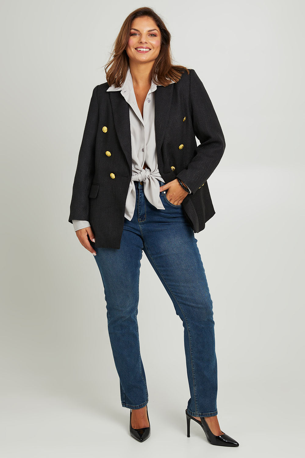 Model Monique wearing size 14 of the Belle Boucle Double Breasted Jacket in colour Black (Black), from the front, showing the whole outfit