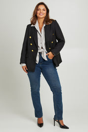 Model Monique wearing size 14 of the Belle Boucle Double Breasted Jacket in colour Black (Black), from the front, showing the whole outfit