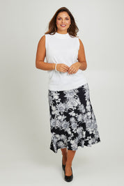 Model Monique wearing size 14 of the Belle Printed Flared Skirt in colour Blackgrey (Black), from the front, showing the whole outfit