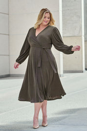 Model Caitlin wearing size 18 of the Belle Full Skirt Dress in colour Khaki (Green), from the front, showing the whole outfit