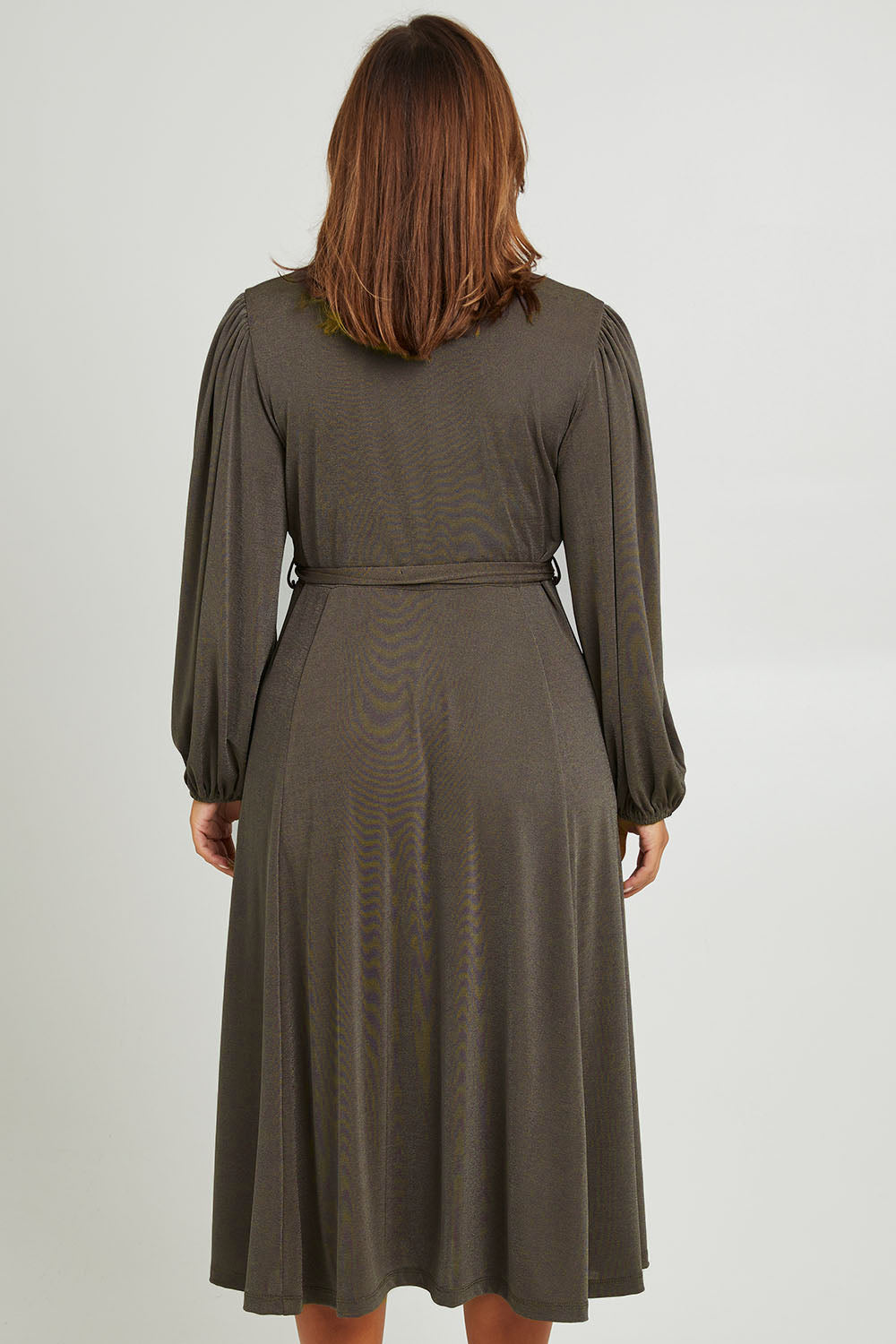 Model Monique wearing size 14 of the Belle Full Skirt Dress in colour Khaki (Green), from the back
