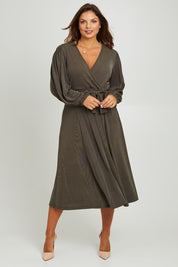 Model Monique wearing size 14 of the Belle Full Skirt Dress in colour Khaki (Green), from the front, showing the whole outfit