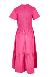 Product shot of the Belle Cotton Shirred Bodice Dress in colour Candypink (Pink), from the back