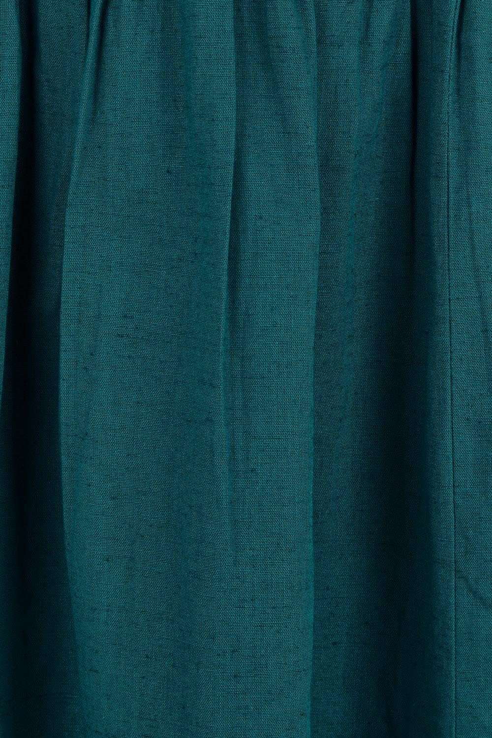 Product shot of the Belle Cotton Shirred Bodice Dress in colour Deepocean (Green), detail
